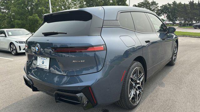 new 2026 BMW iX car, priced at $97,560