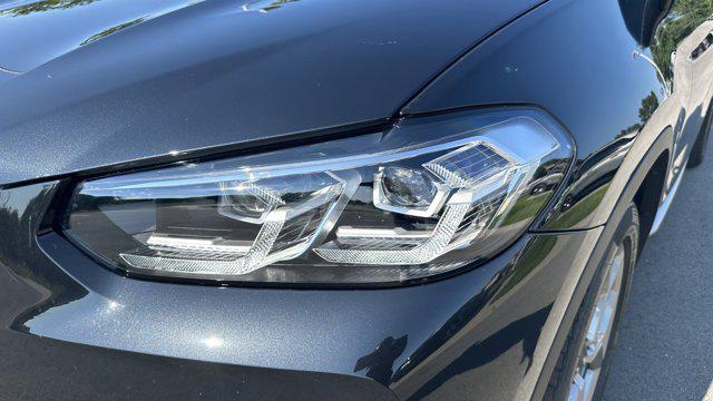 used 2024 BMW X4 car, priced at $59,045