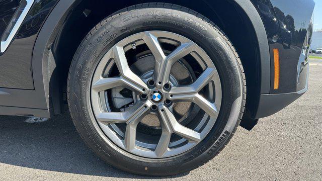used 2024 BMW X4 car, priced at $59,045