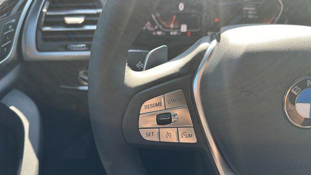 used 2024 BMW X4 car, priced at $59,045