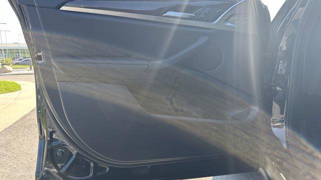 used 2024 BMW X4 car, priced at $59,045