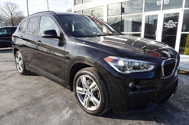 used 2018 BMW X1 car, priced at $19,990