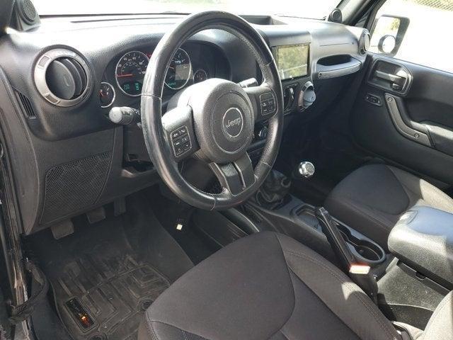 used 2014 Jeep Wrangler Unlimited car, priced at $21,950