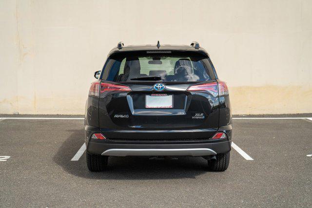 used 2018 Toyota RAV4 Hybrid car, priced at $17,490
