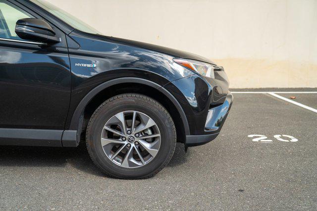used 2018 Toyota RAV4 Hybrid car, priced at $17,490