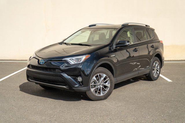 used 2018 Toyota RAV4 Hybrid car, priced at $17,490