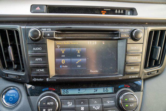 used 2018 Toyota RAV4 Hybrid car, priced at $17,490