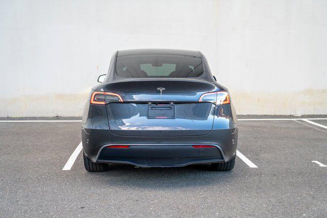 used 2025 Tesla Model Y car, priced at $34,995