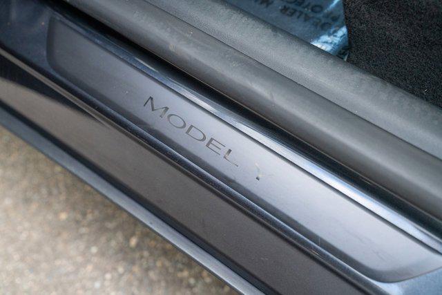used 2025 Tesla Model Y car, priced at $34,995