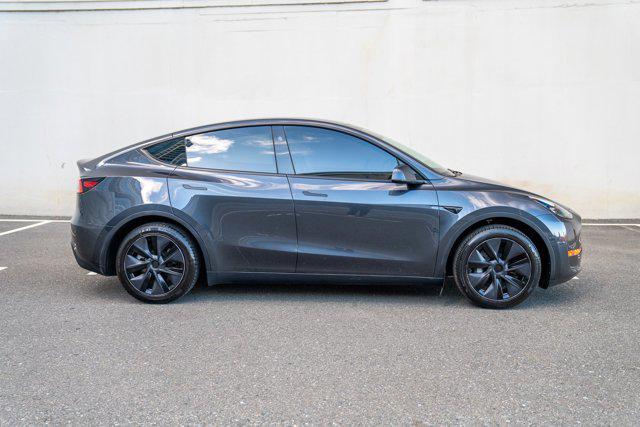 used 2025 Tesla Model Y car, priced at $34,995