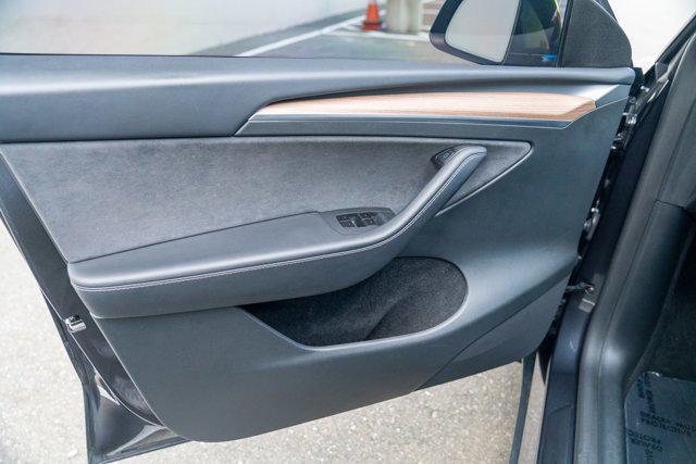 used 2025 Tesla Model Y car, priced at $34,995