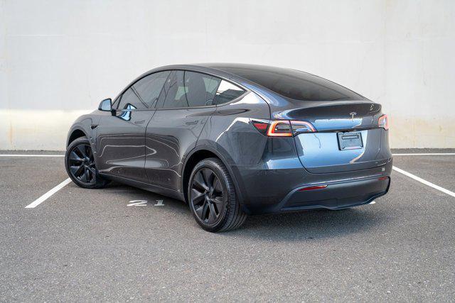 used 2025 Tesla Model Y car, priced at $34,995