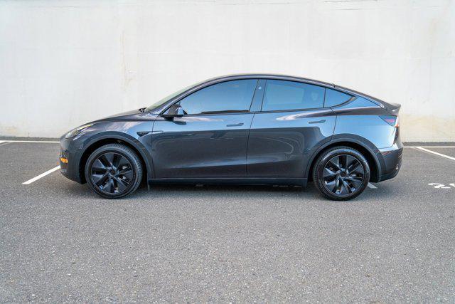 used 2025 Tesla Model Y car, priced at $34,995