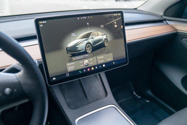 used 2025 Tesla Model Y car, priced at $34,995