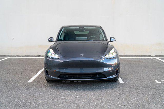 used 2025 Tesla Model Y car, priced at $34,995