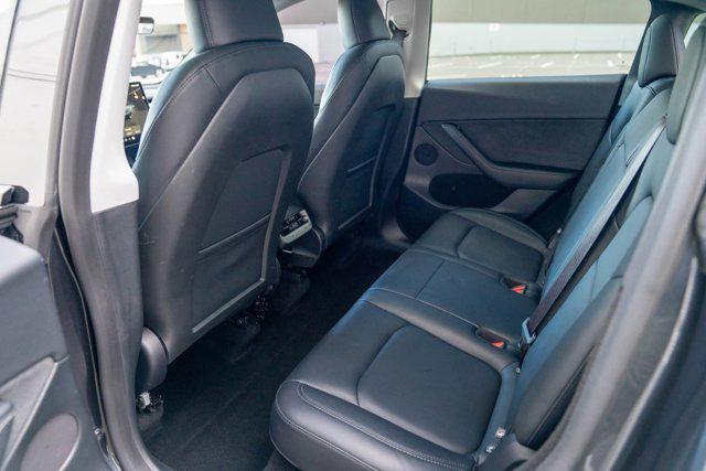 used 2025 Tesla Model Y car, priced at $34,995