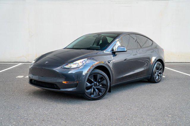 used 2025 Tesla Model Y car, priced at $34,995