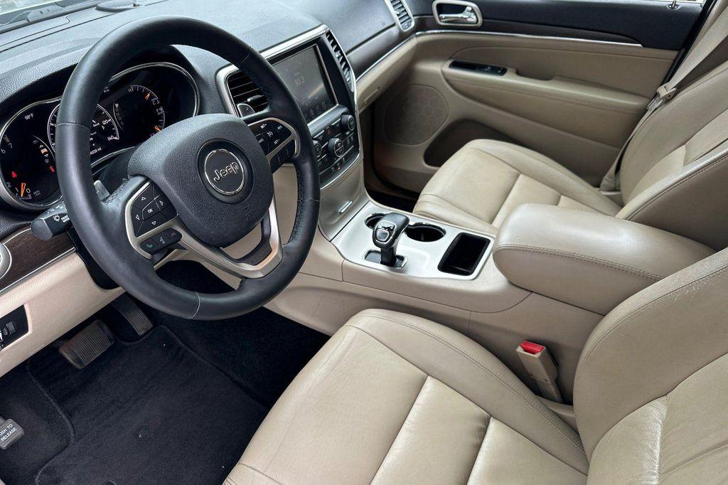 used 2014 Jeep Grand Cherokee car, priced at $10,988