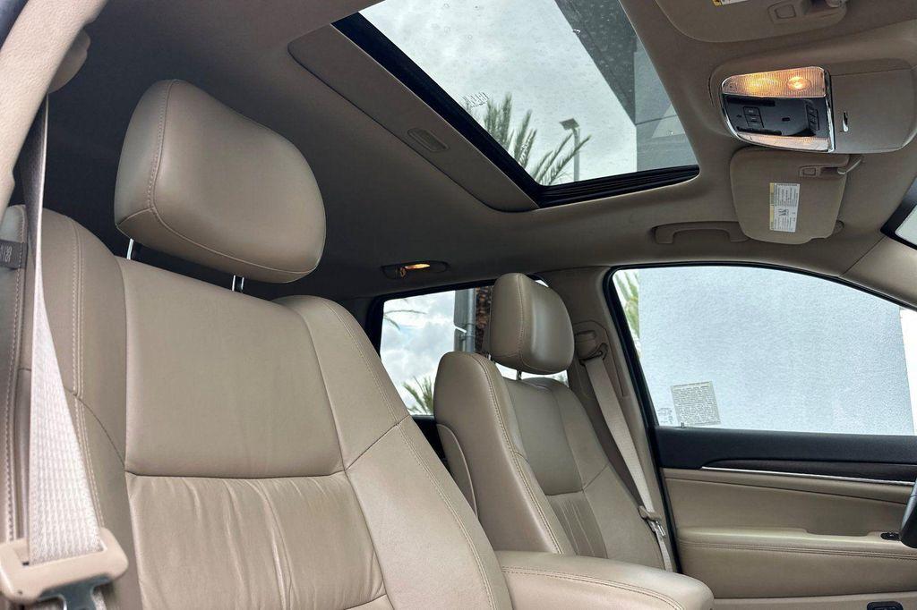 used 2014 Jeep Grand Cherokee car, priced at $10,988