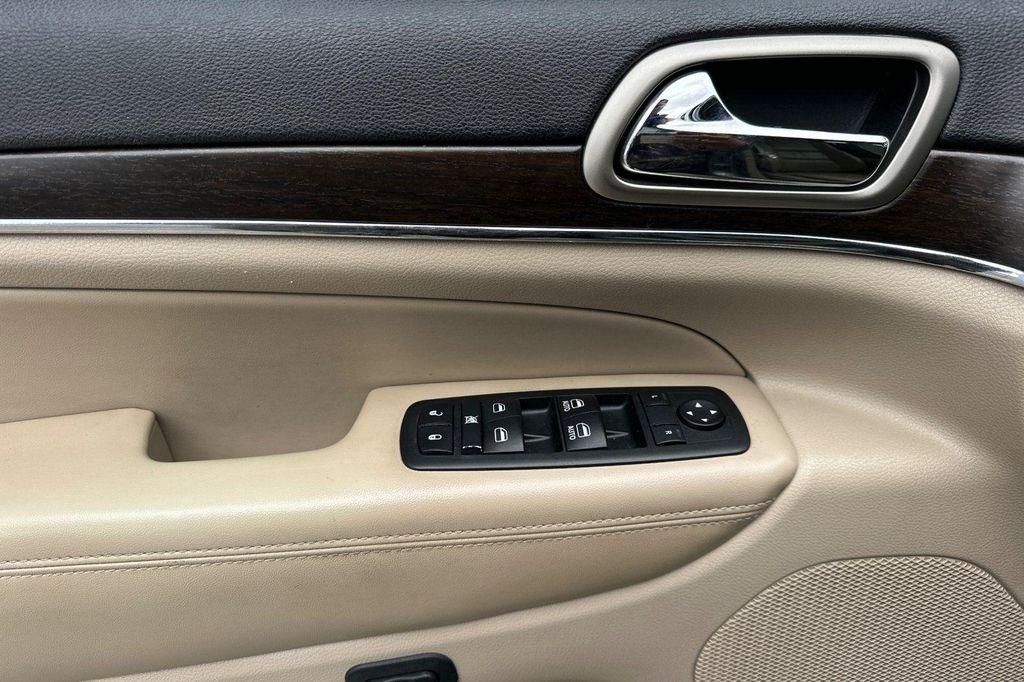 used 2014 Jeep Grand Cherokee car, priced at $10,988