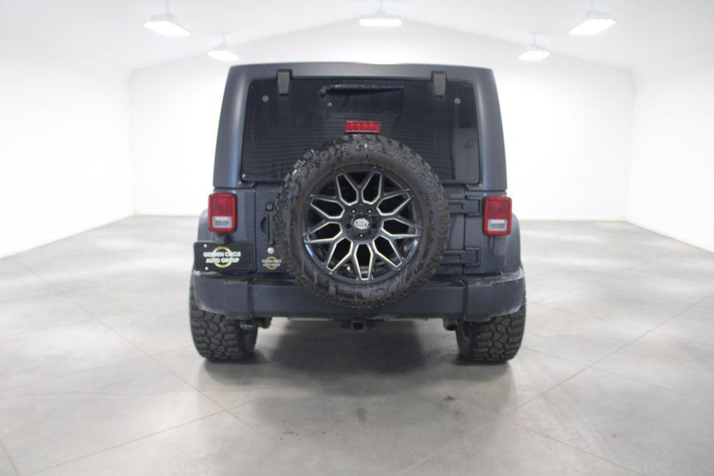 used 2016 Jeep Wrangler Unlimited car, priced at $23,178