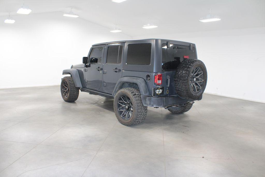 used 2016 Jeep Wrangler Unlimited car, priced at $23,178