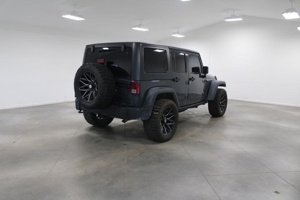 used 2016 Jeep Wrangler Unlimited car, priced at $23,178