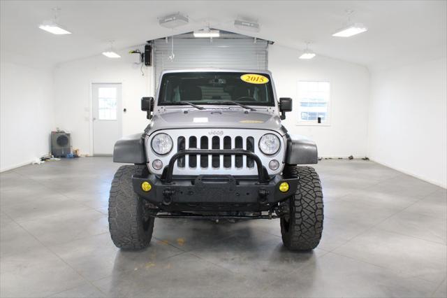 used 2015 Jeep Wrangler Unlimited car, priced at $21,697