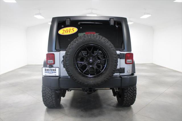 used 2015 Jeep Wrangler Unlimited car, priced at $21,697