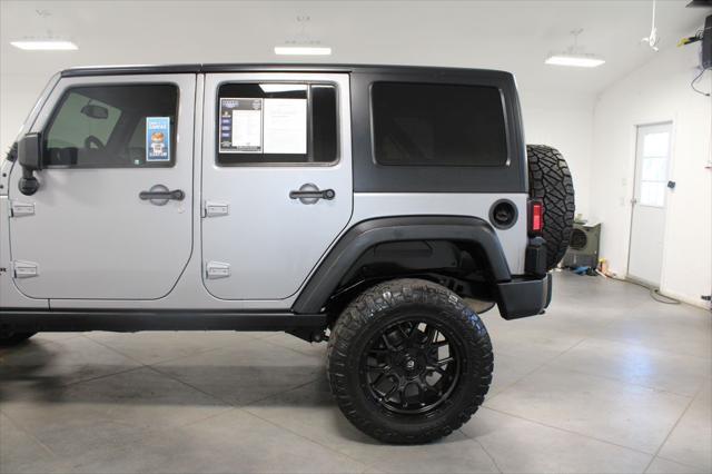 used 2015 Jeep Wrangler Unlimited car, priced at $21,697