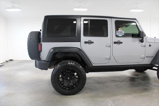 used 2015 Jeep Wrangler Unlimited car, priced at $21,697