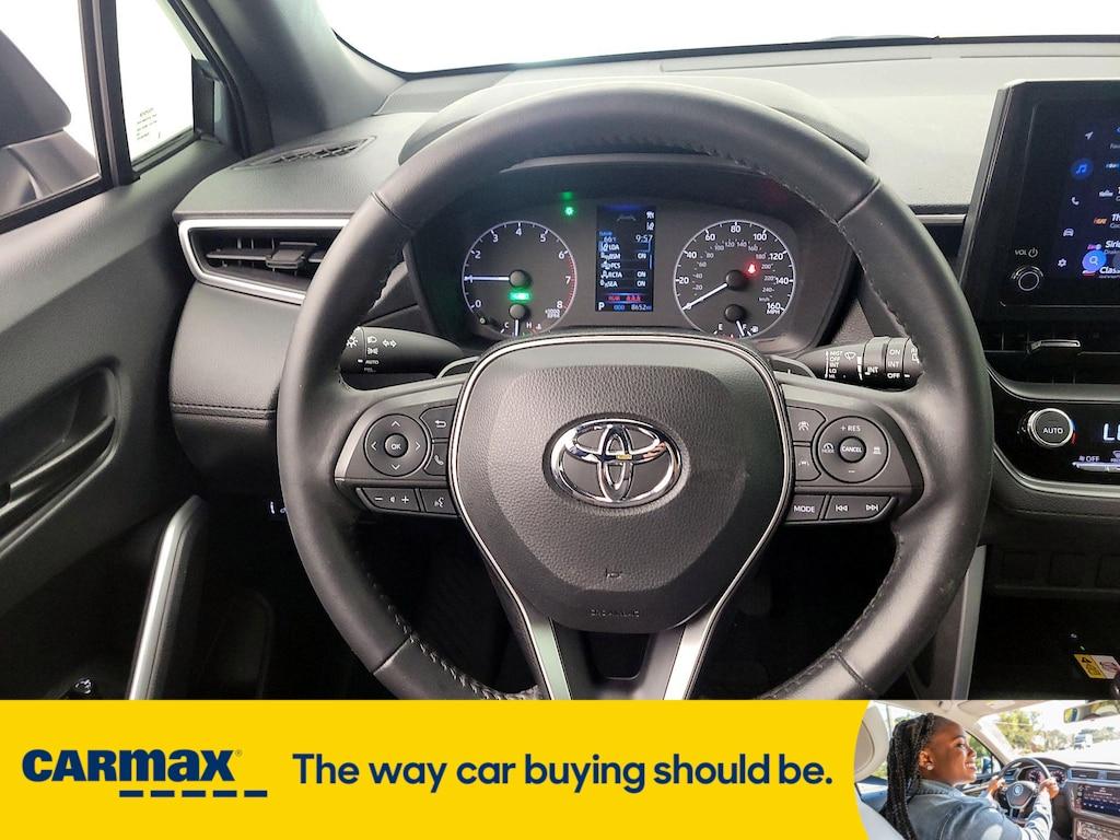used 2023 Toyota Corolla Cross Hybrid car, priced at $31,998