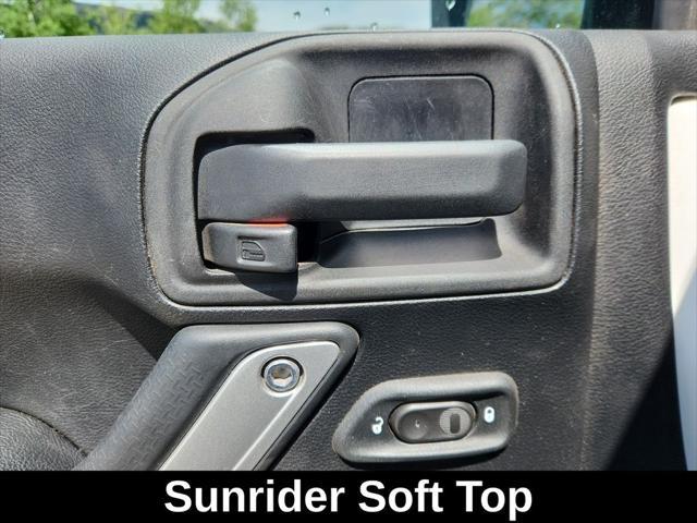 used 2015 Jeep Wrangler Unlimited car, priced at $31,999
