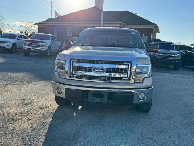 used 2014 Ford F-150 car, priced at $14,400