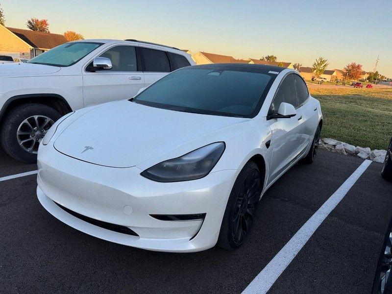 used 2023 Tesla Model 3 car, priced at $30,900