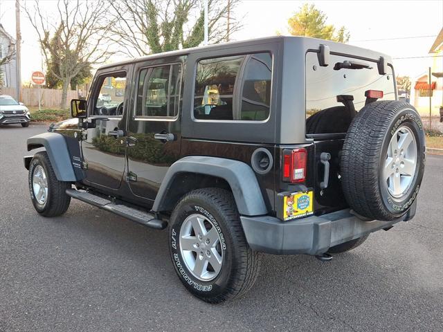 used 2015 Jeep Wrangler Unlimited car, priced at $15,000