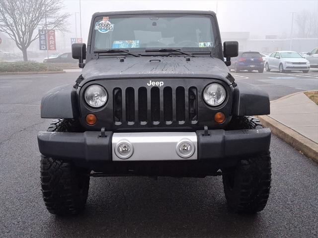 used 2012 Jeep Wrangler Unlimited car, priced at $14,990