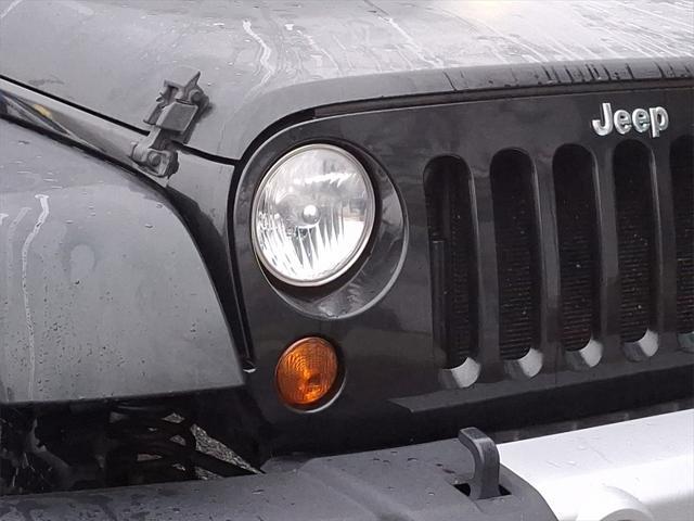 used 2012 Jeep Wrangler Unlimited car, priced at $14,990