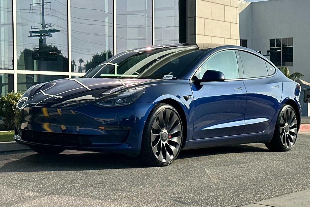 used 2022 Tesla Model 3 car, priced at $34,995