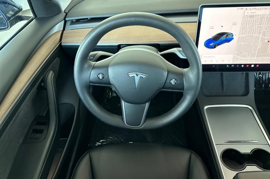 used 2022 Tesla Model 3 car, priced at $34,995