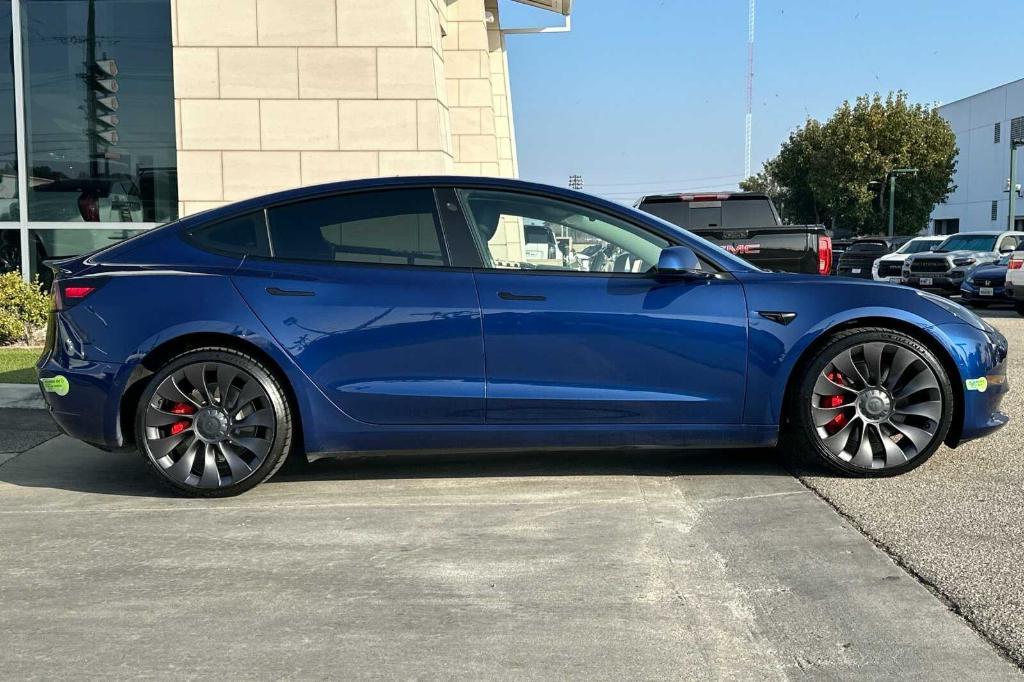 used 2022 Tesla Model 3 car, priced at $34,995