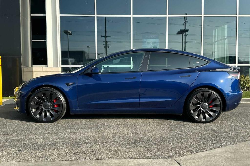 used 2022 Tesla Model 3 car, priced at $34,995