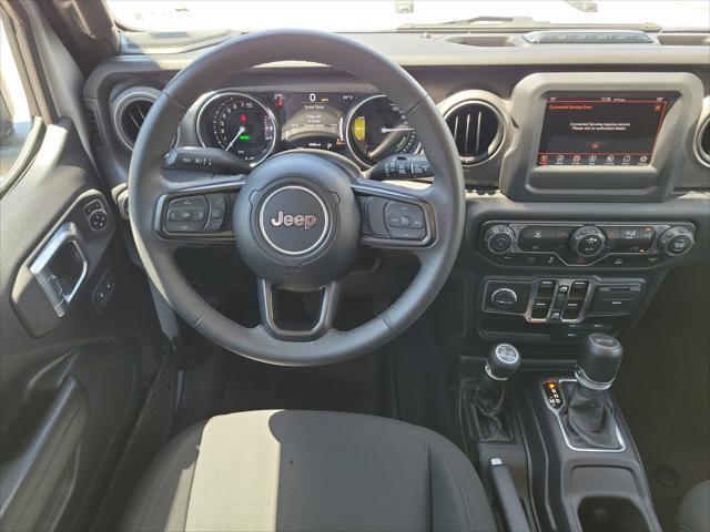 used 2023 Jeep Wrangler 4xe car, priced at $29,988