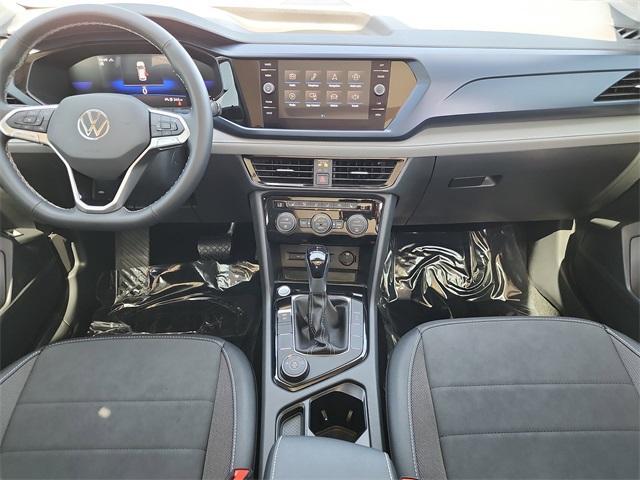 used 2024 Volkswagen Taos car, priced at $25,435