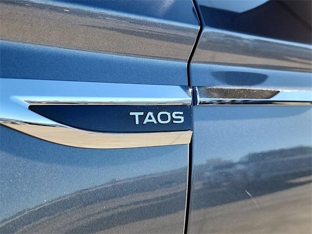 used 2024 Volkswagen Taos car, priced at $23,609