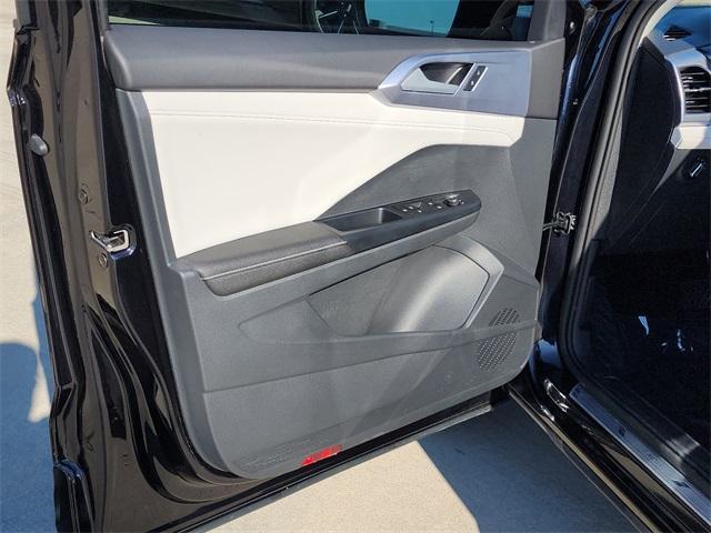 used 2025 Volkswagen Taos car, priced at $25,656