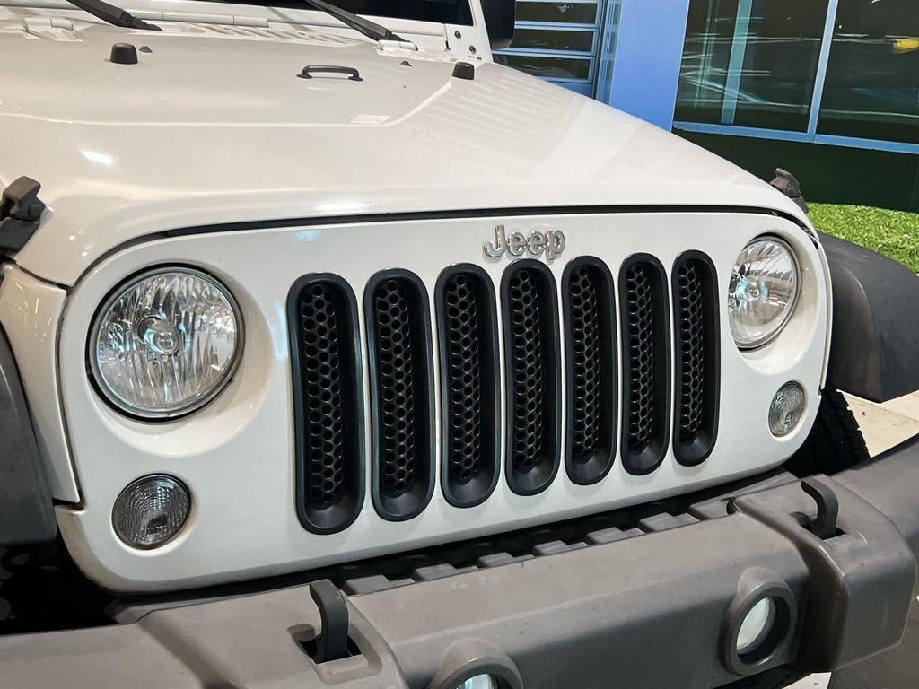 used 2015 Jeep Wrangler Unlimited car, priced at $17,455
