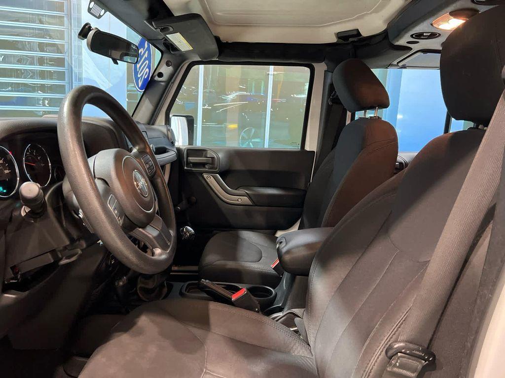 used 2015 Jeep Wrangler Unlimited car, priced at $17,455