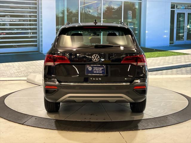 used 2023 Volkswagen Taos car, priced at $21,806