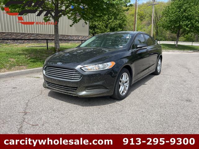 used 2014 Ford Fusion car, priced at $5,977